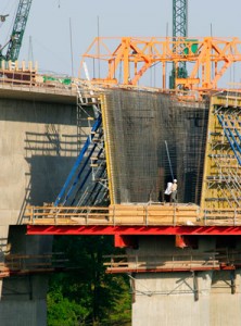 Bridge inspectors on scaffolding during maintenance